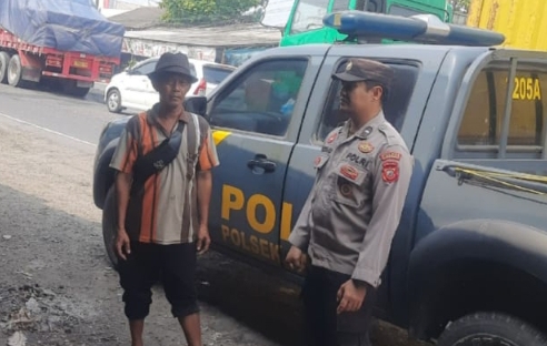 Polsek Jatisari Lakukan Patroli Malam di Pertigaan Cikalong
