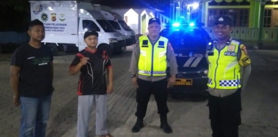 Personil Polsek Jatisari Laksanakan Patroli Malam Sapa Warga, Sampaikan Himbauan Kamtibmas