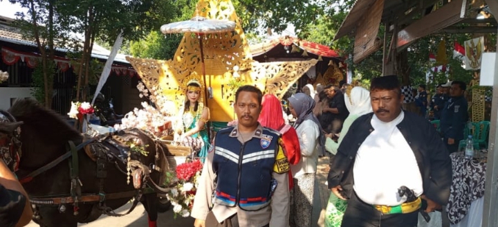 Polsek Jatisari Amankan Kegiatan Kirab Budaya dalam Rangka Peringatan HUT RI di Perum Bumi Cikampek Baru