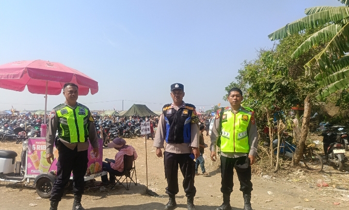 Personel Polsek Klari Laksanakan Pengamanan Kegiatan Pramuka di Lokasi Perkemahan Desa Belendung