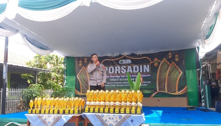 Personel Polsek Klari Hadiri Pembukaan PORSADIN Tingkat Kecamatan Klari