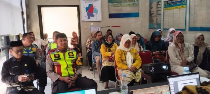 Personel Polsek Jatisari Hadiri Lokakarya Mini Lintas Sektor Bidang Kesehatan di UPTD Puskesmas Desa Pacing